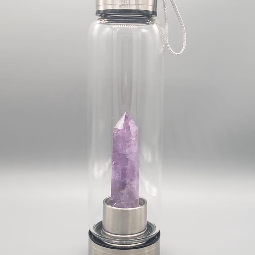 Amethyst crystal water bottle, new still in box. Purchased as gift